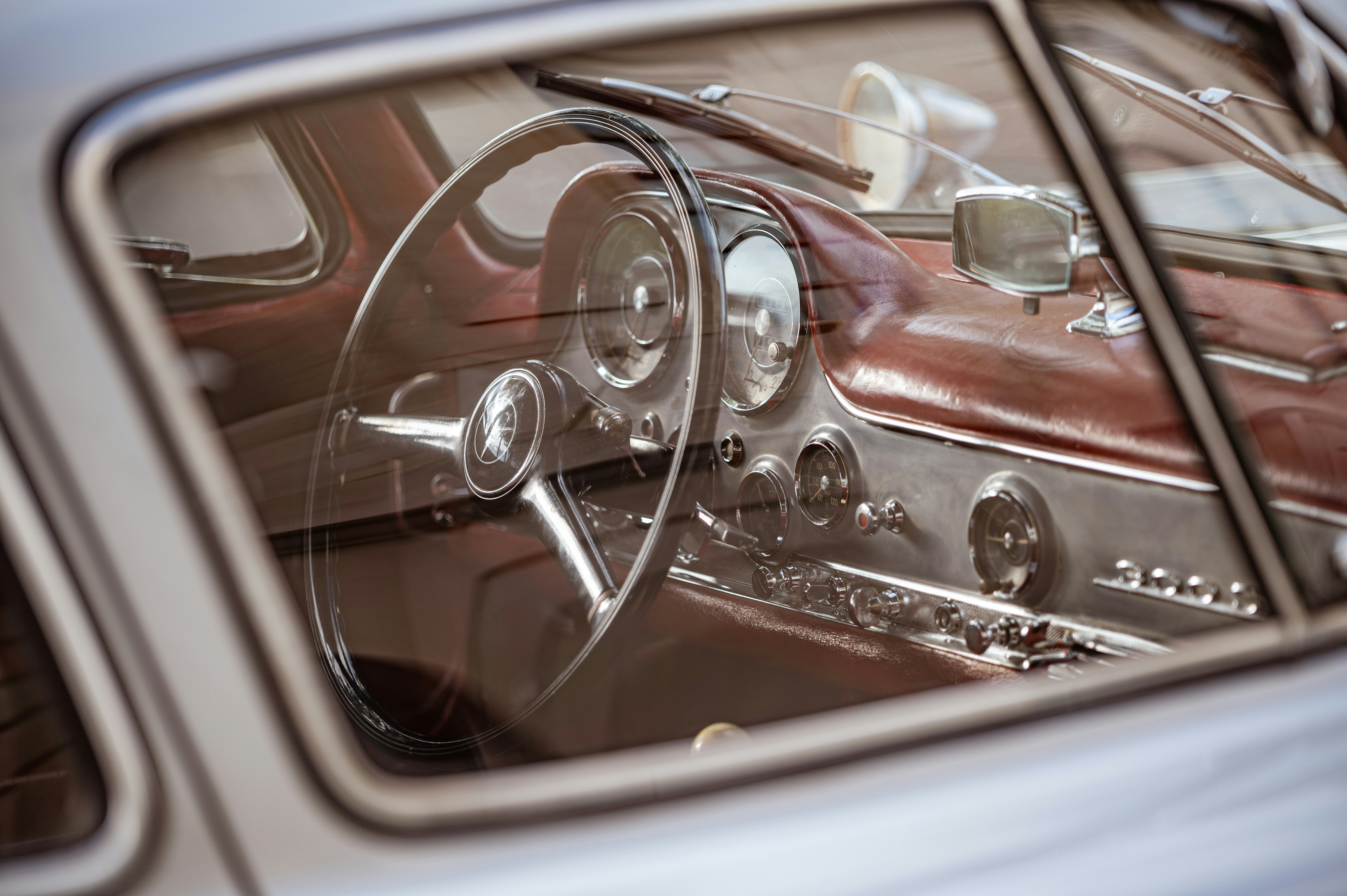 red and silver car steering wheel